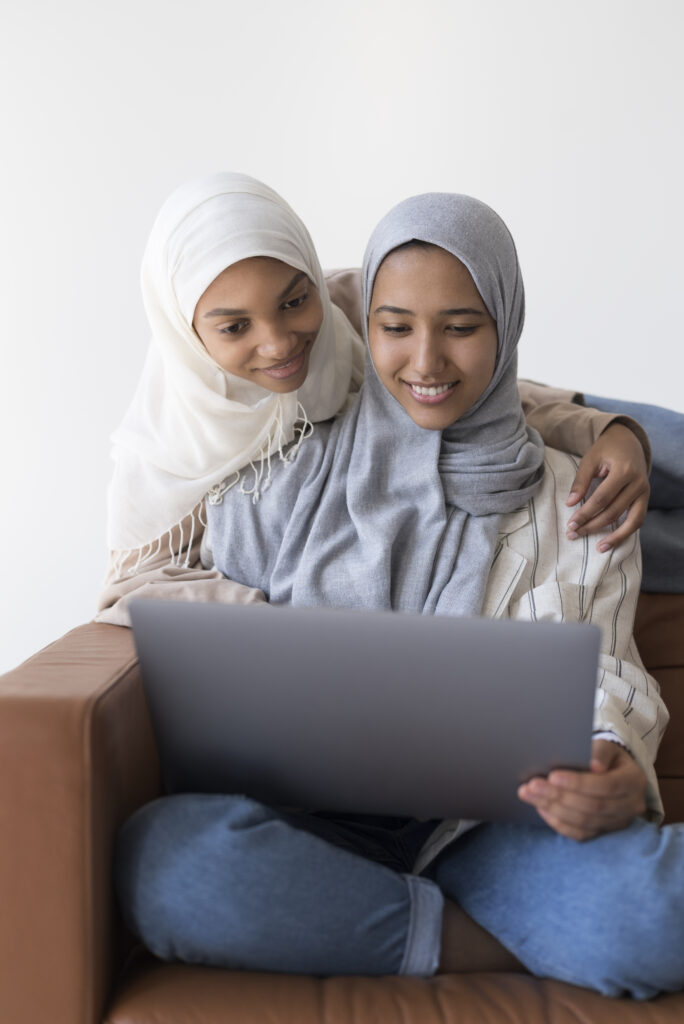 Muslim women Choosing the Right Online Quran Teacher, representing online Quran learning with a supportive atmosphere